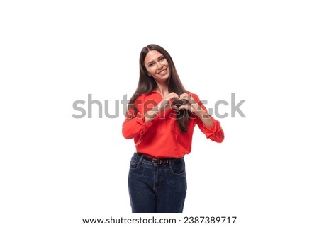 pretty confident successful young brunette business woman dressed in a red blouse on a white background with copy space