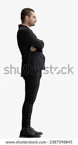 young man in full growth. isolated on white background profile