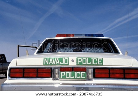 Car of the Navajo Nation Police with a clear blue sky Royalty-Free Stock Photo #2387406735