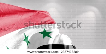 Iraq  national flag cloth fabric waving on beautiful lightBackground.