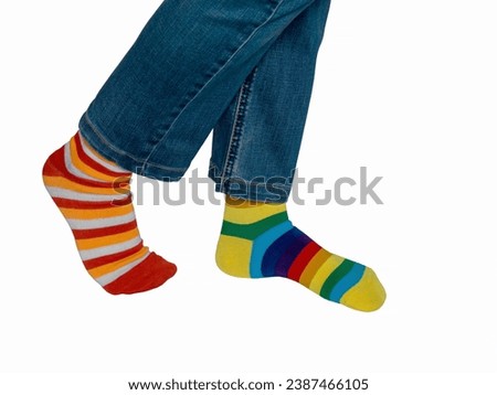 Lonely Sock Day. The social problem of bullying. Strange Socks Day. Strange socks as a symbol of Down syndrome Royalty-Free Stock Photo #2387466105