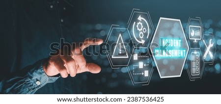 Incident management concept, Person hand touching incident management icon on virtual screen. Royalty-Free Stock Photo #2387536425