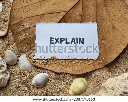 Explain writing on beach sand background.