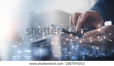 Social media marketing, global business, IoT Internet of Things concept. Woman using mobile phone for online shopping and digital banking via mobile app, e-commerce, multichannel marketing Royalty-Free Stock Photo #2387591013