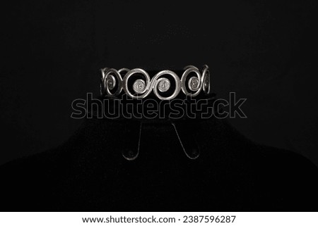 Old and antique Hmong Silver bangle Royalty-Free Stock Photo #2387596287
