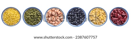 Collection of mix bean (green mung, yellow split bean, red kidney, black bean, yellow split peas, panut) in a bowl isolated on white background with clipping path. Royalty-Free Stock Photo #2387607757
