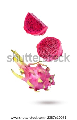 Red dragon fruit (Pitaya) flying in the air isolated on white background 