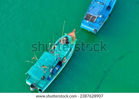 Aerial view from the cable car to the national Vietnamese wooden fishing boats on sea An Thoi harbor. Phu Quoc island, Vietnam