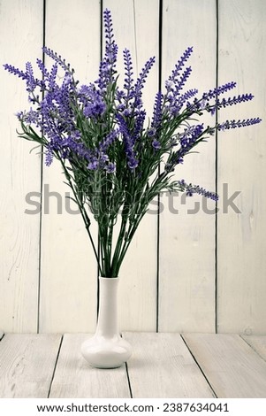 lavender is flowers.Bouquet of roses, chrysanthemums,lilies,azaleas,tulips.On a wooden background.For my birthday. valentine's day.for weddings.The concept of the holiday.For the designer.postcards