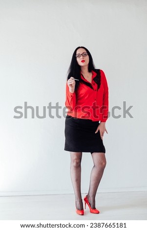 female teacher with pointer in classroom office