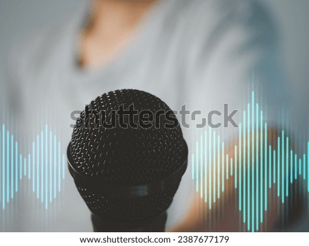 microphone with waveform that is broadcasting on the radio or recording in a studio