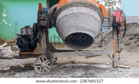 photo of a mini cast iron concrete mixer