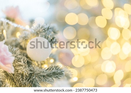 Christmas tree toy in the form of a ball on a branch. Christmas mood background. Vacation atmosphere. Comfort, huge coziness concept