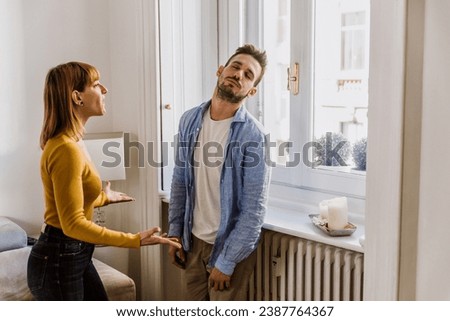 Couple fighting at home. Argue between man and woman, family problems