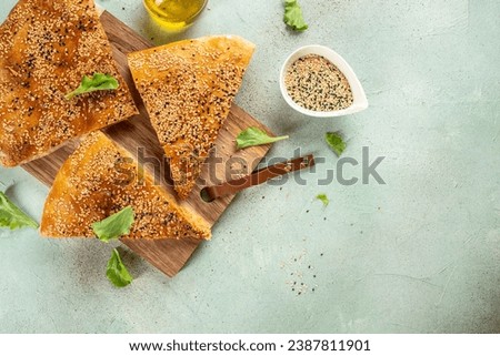 pie with potatoes on a light background top view. copy space. Royalty-Free Stock Photo #2387811901