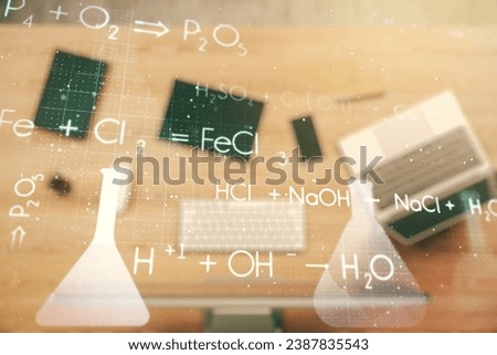 Creative chemistry hologram on modern laptop background, pharmaceutical research concept. Multiexposure