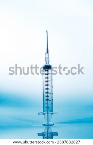 macro syringe,A 5ml syringe and needle isolated on a white background with detailed clipping path,Close up of a syringe. Focus on numbers. Royalty-Free Stock Photo #2387882827