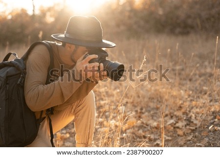 Nature photographer, Photographer in autumn working on sunset. Copy space