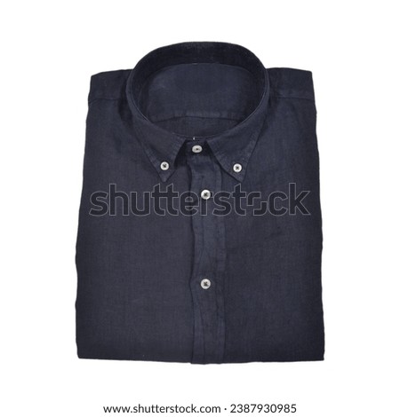 Folded button-down blue linen shirt on white background. Photography for a clothing store website. Photo for social networks of a clothing store.