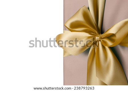 greeting card with golden bow on the white background