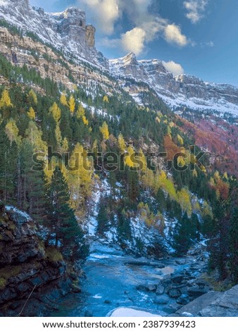 Ordesa Valley, in the Pyrenees of Huesca, Spain. Colorful autumn picture with trees with yellow and red leaves