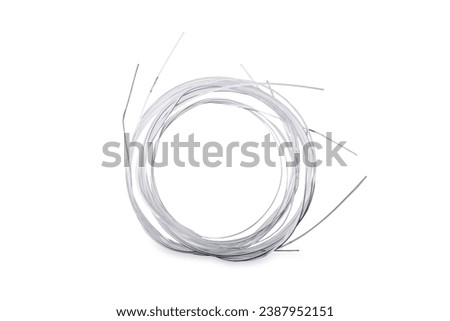 Guitar strings on a white isolated background.