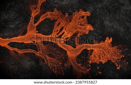 Aerial view of the texture of a solidifying lava field, close-up Royalty-Free Stock Photo #2387955827