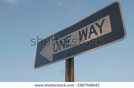 One way sign against a Blue Sky