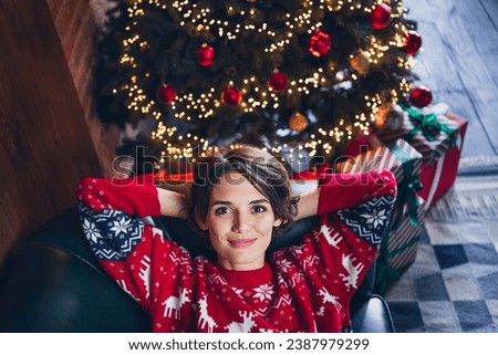 Comfort time young girl relax hands head christmas atmosphere lying divan lovely holly jolly 2024 isolated near xmas tree background Royalty-Free Stock Photo #2387979299