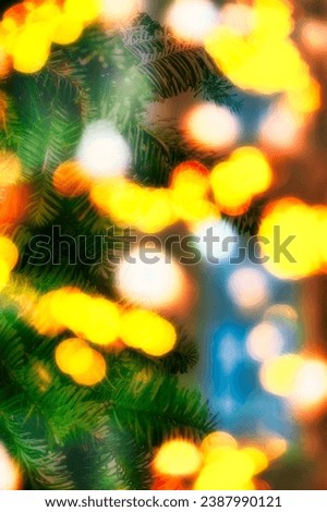 a background picture of festive bokey blurry christmas lights during the holiday season