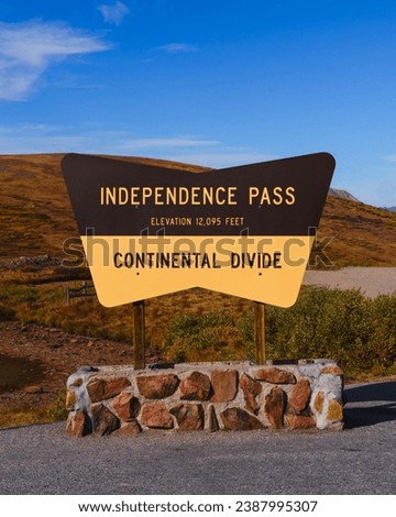 Close up view of Independence pass continental divide sign