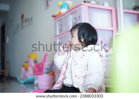 chinese kids smile girl chappiness Royalty-Free Stock Photo #2388033303