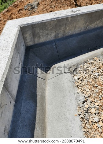 cast in situ v-shaped drain at wall Royalty-Free Stock Photo #2388070491