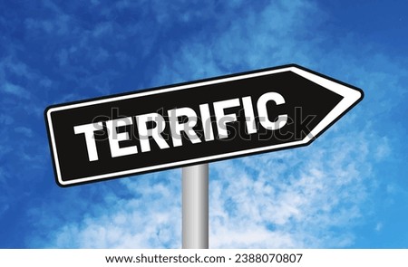 Terrific road sign on blue sky background Royalty-Free Stock Photo #2388070807