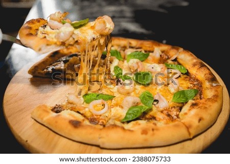 Pizza with spicy shrimp and basil