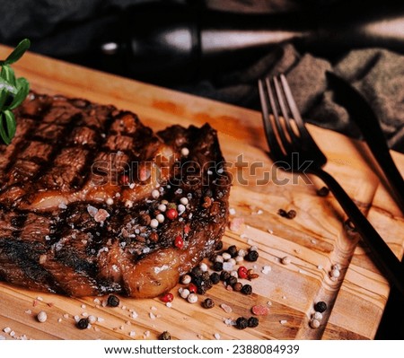 Gourmet grill restaurant steak menu - new york beef steak on wooden background