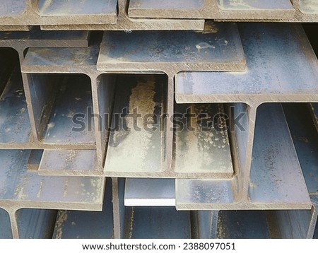 products of the plant for the production of metal structures. Welded I-beam and H-Beams. Royalty-Free Stock Photo #2388097051