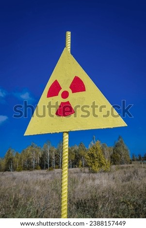 Warning sign next to Red Forest in Chernobyl Exclusion Zone in Ukraine