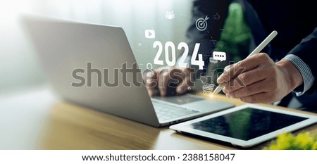 Digital Marketing Trends 2024, analytical businessman planning business growth 2024, strategy digital marketing, profit income, economy, stock market trends and business, technical analysis strategy Royalty-Free Stock Photo #2388158047