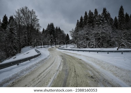 Road covered with snow in the Ukrainian Carpathians