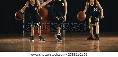 Basketball Training Unit For Youth Players. Youth Basketball Players in a Team on Training Drill. Young Boys on Basketball Bractice