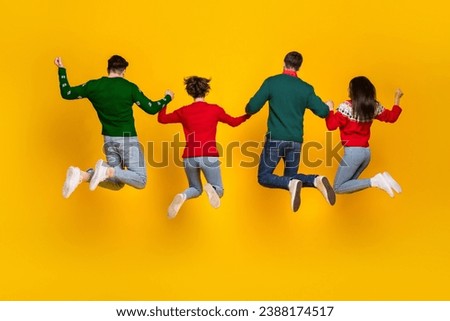 Back view photo of four people buddies jumping enjoying x mas christmas festive offers isolated bright color background