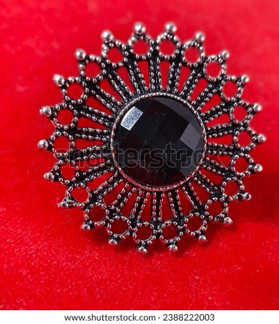 Beautiful Picture of an Women Designer Ring with Red Background.