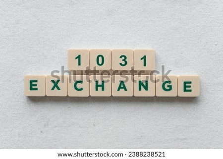 "1031 exchange" made with green letters. Concept of doing a good 1031 exchange with your property Royalty-Free Stock Photo #2388238521
