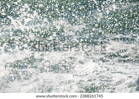foam and spray from a breaking wave