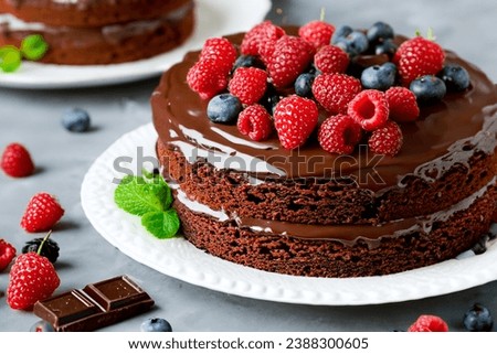 Luxurious layer cake with chocolate and mixed berries
