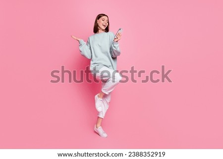 Full size photo of young girl speak smartphone video shoot selfie fast connection 4g isolated over pink color background