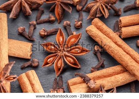 Lots of three spices for mulled wine – star anise, cinnamon and clove, macro. Great background for your projects.