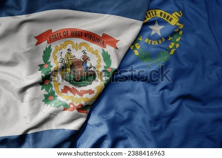 big waving colorful national flag of nevada state and flag of west virginia state . macro