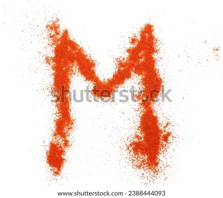 Red paprika powder alphabet letter M, symbol isolated on white, clipping path